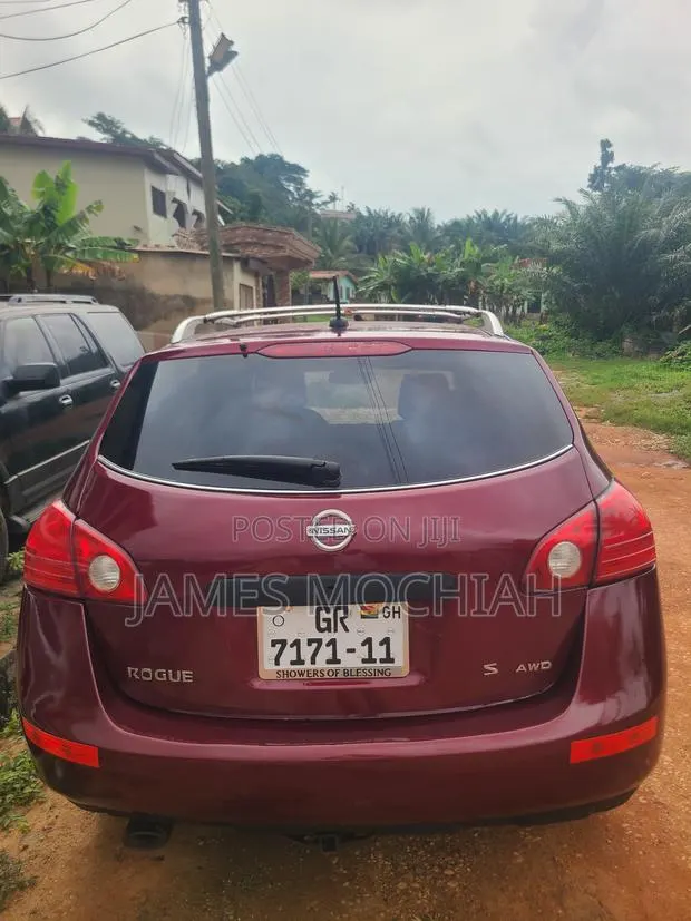 Nissan Rogue 2009 Red · Photo 1