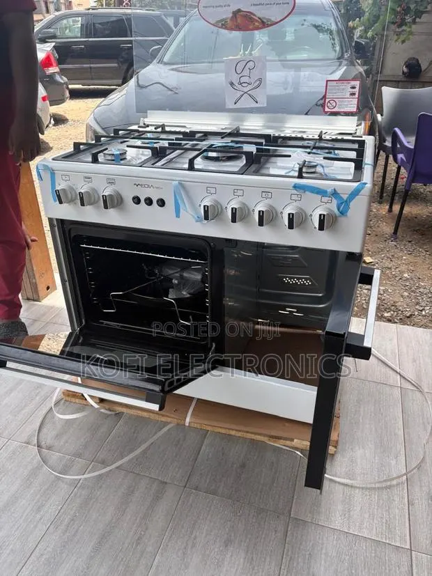 Mediatech 60x90 White Gas Cooker With Oven Built for Modern Homes · Photo 1