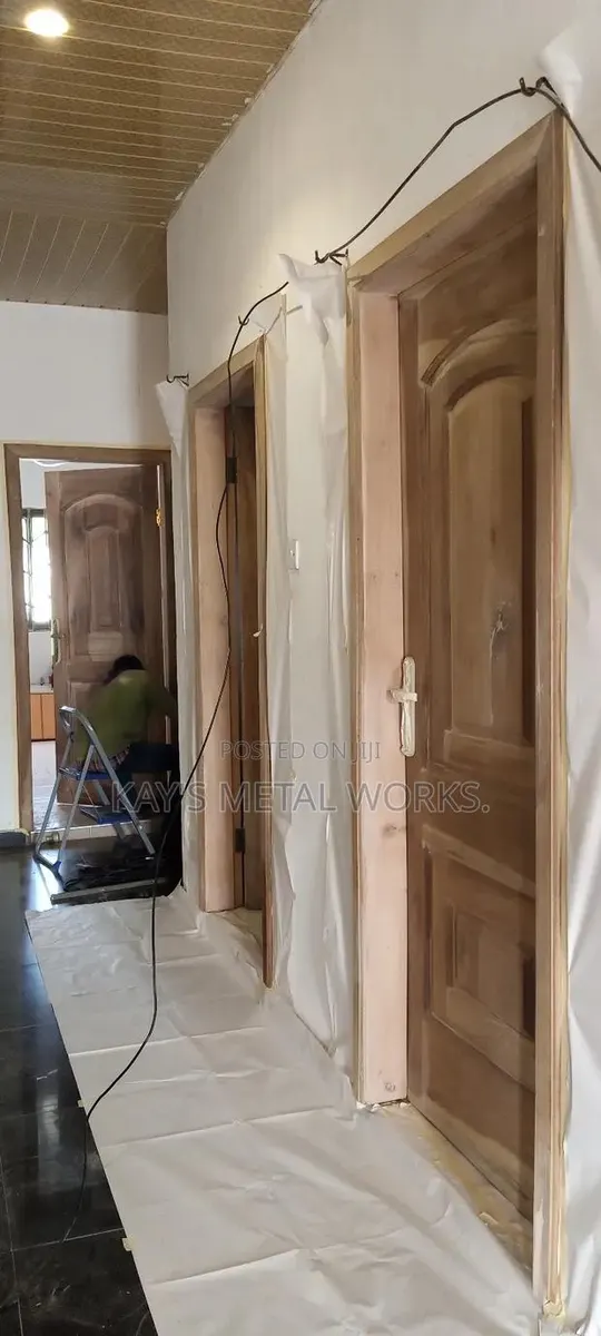 Professional Wood Door Spray Painting Refinishing · Photo 1