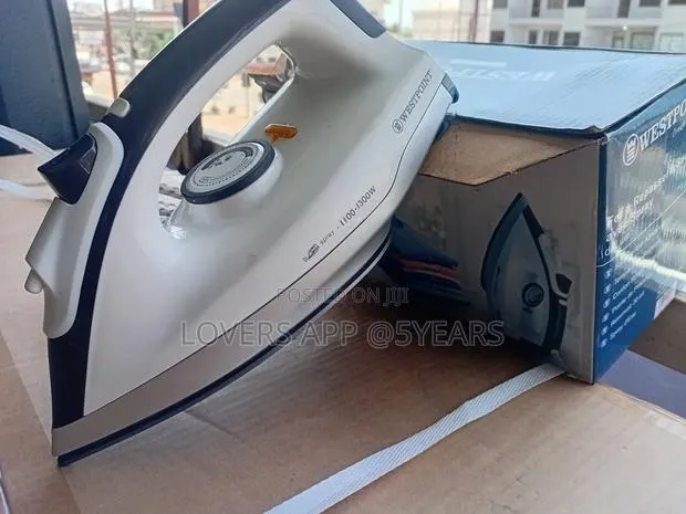 Westpoint 1100W Dry Iron Non Stick Iron · Photo 1