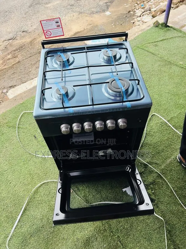 Ultra Modern Sleek Gas Cooker Oven 50/50 4burner · Photo 1