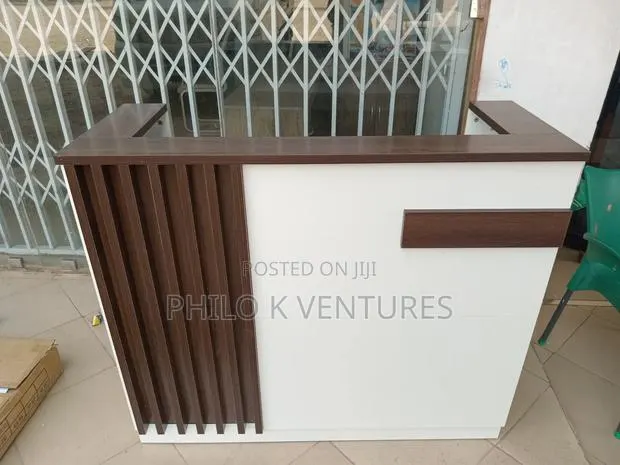 Brown and White Information Desk · Photo 1