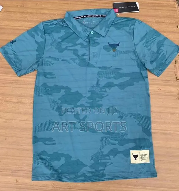 Under Amour Polo Top · Photo 1