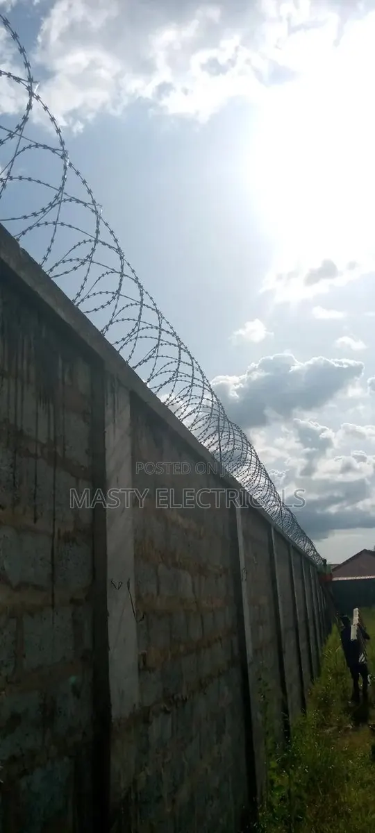 Razor Wire Fence · Photo 1