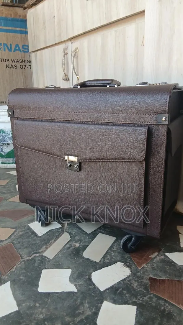 Brown Leather Suitcase · Photo 1