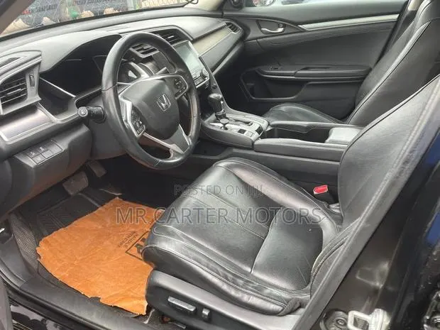Honda Civic Touring 4dr Sedan (1.5L 4cyl) 2016 Black · Photo 1