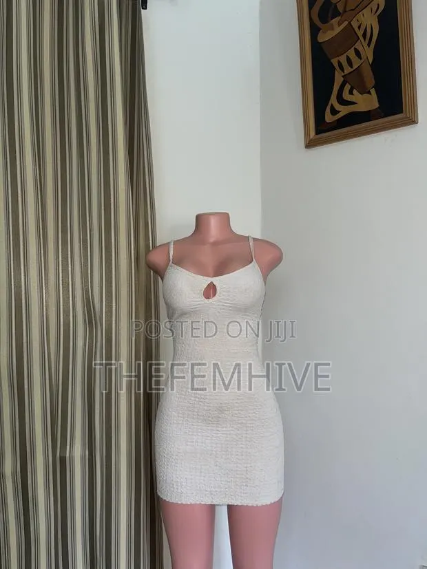 Nude Sleeveless Bodycon Dress Thrift · Photo 1