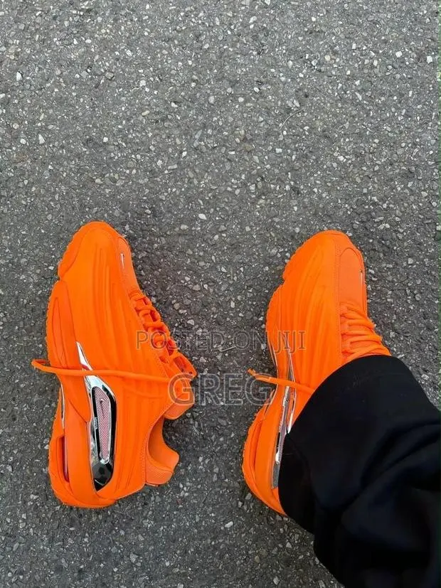 Nike X NOCTA Hot Step “Orange” · Photo 1