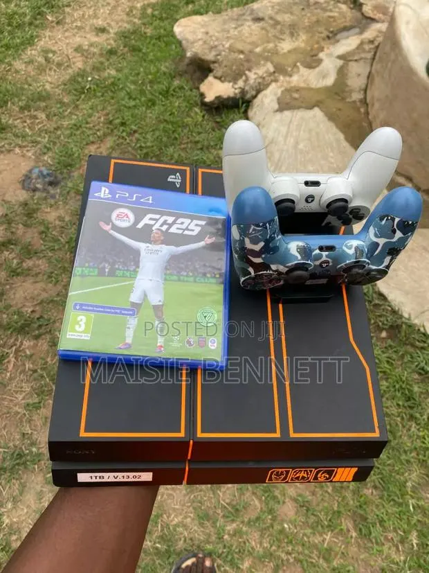PS4 Slim 1TB + 2 Controllers + Disc + 2 games.Neat · Photo 1