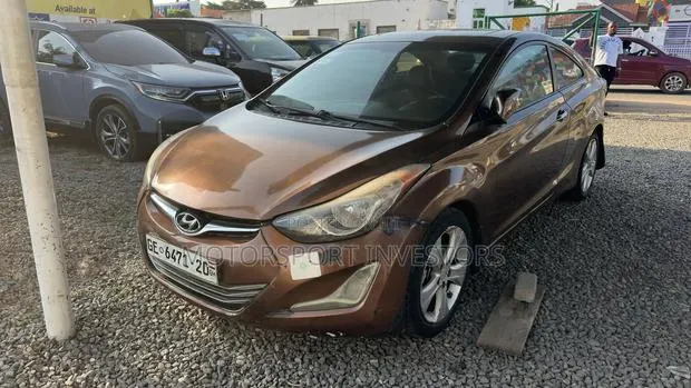 Hyundai Elantra GS Coupe FWD (1.8L 4cyl 6A) 2013 Brown · Photo 1