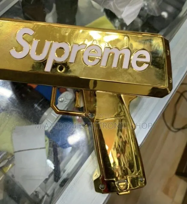 Sealed in Box Supreme Money Gun. · Photo 1