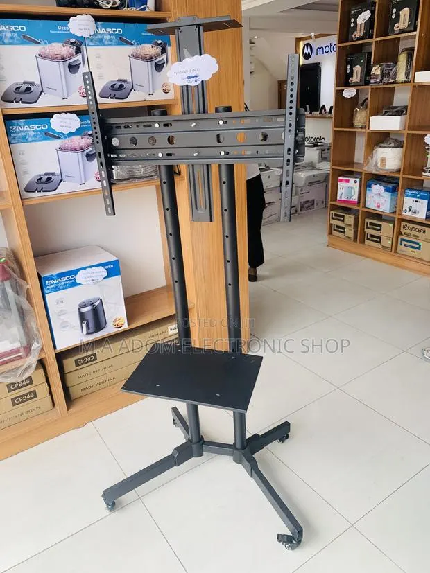 Flexible Tv Stand for Tv 32”-70” · Photo 1