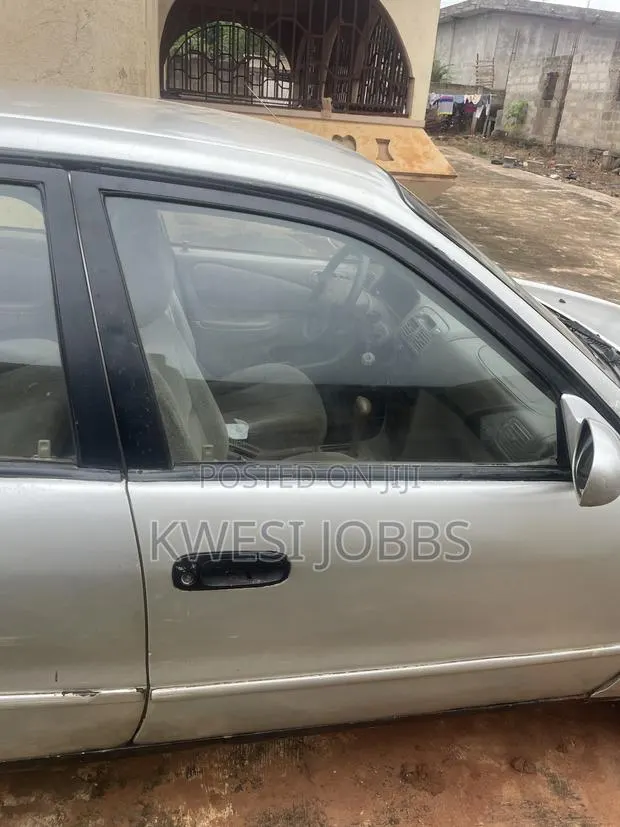 Toyota Corolla Sedan 2003 Gray · Photo 1