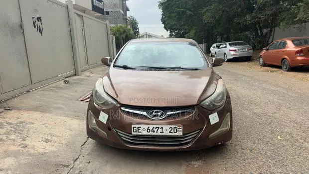 Hyundai Elantra SE Coupe FWD (1.8L 4cyl 6A) 2013 Brown · Photo 1