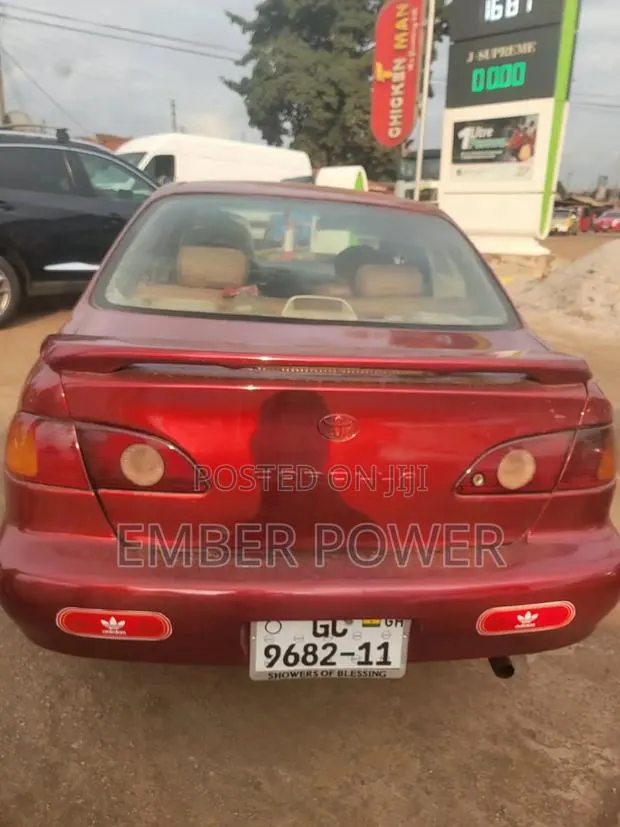 Toyota Corolla 2004 Red · Photo 1