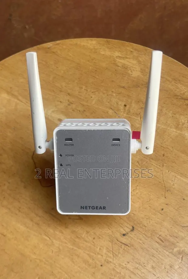 Netgear Ex2700 Wifi Range Extender N300 Wireless Signal Booster Uk · Photo 1