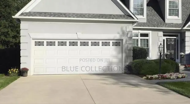 10 ×8automated Garage Door With Fanlight · Photo 1