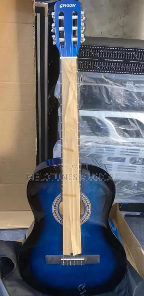 Givson Blue Acoustic Guitar · Photo 1