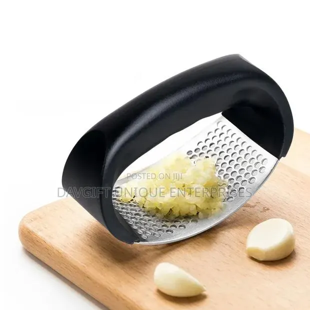 Quality Stainless Garlic Presser · Photo 1