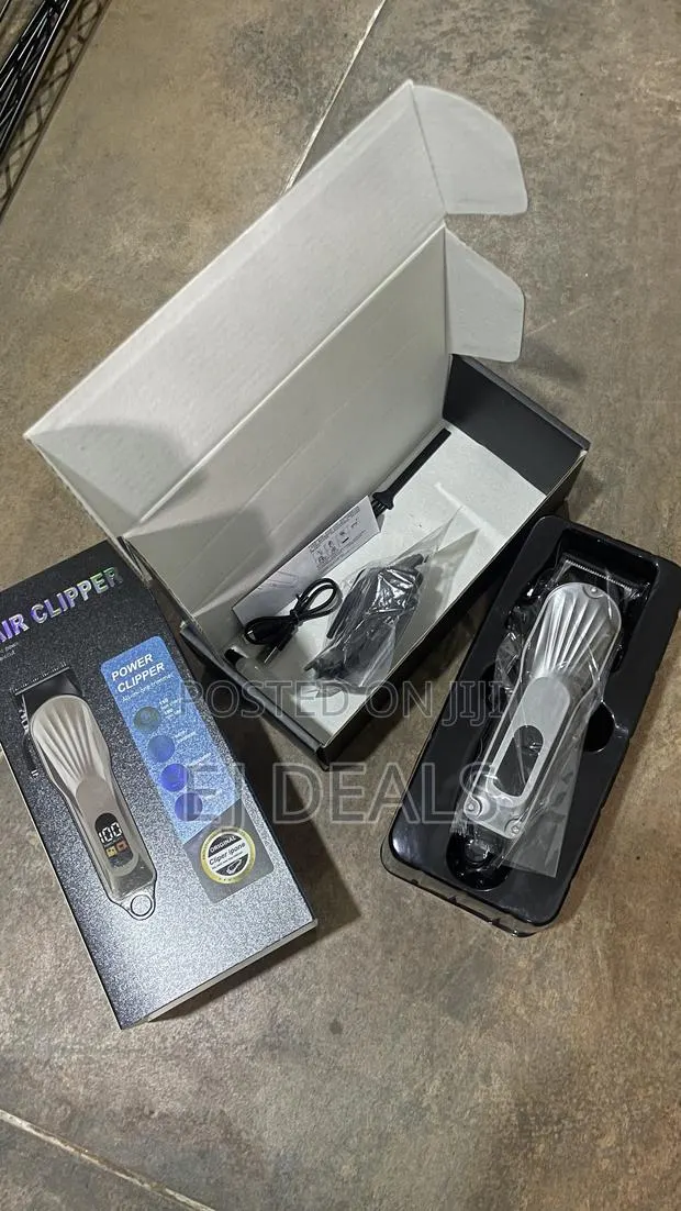 Genuine TOUPHY Professional Rechargeable Cordless Hair Clipper UK · Photo 1