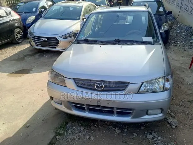 Mazda Demio 2010 Silver · Photo 1