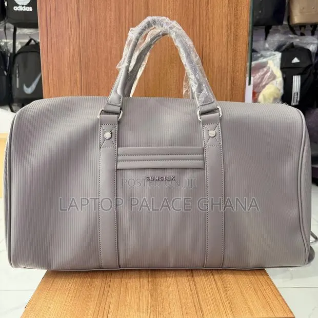 Sunsilk Strip Leather Duffle Bag · Photo 1