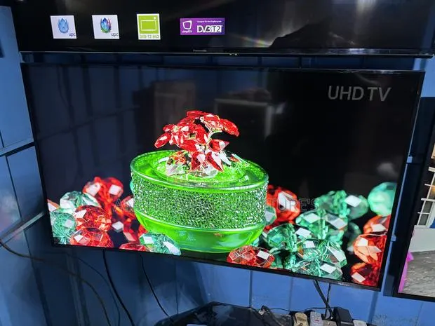 Samsung 55 Inch Curved,Inbuilt Decoder,Bluetooth,Netflix,Youtube Tv · Photo 1