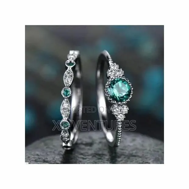 Emerald Wedding Rings · Photo 1