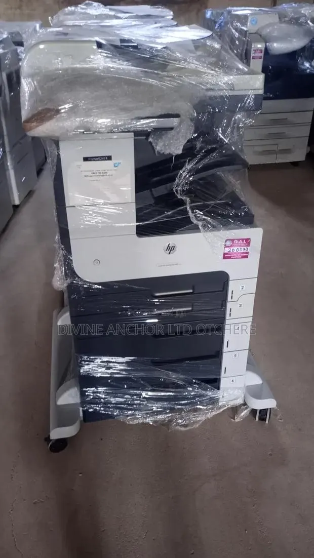 HP M725. Black and White Copier · Photo 1
