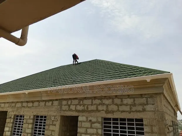 Roman Green Roofing Sheet and Installation. · Photo 1