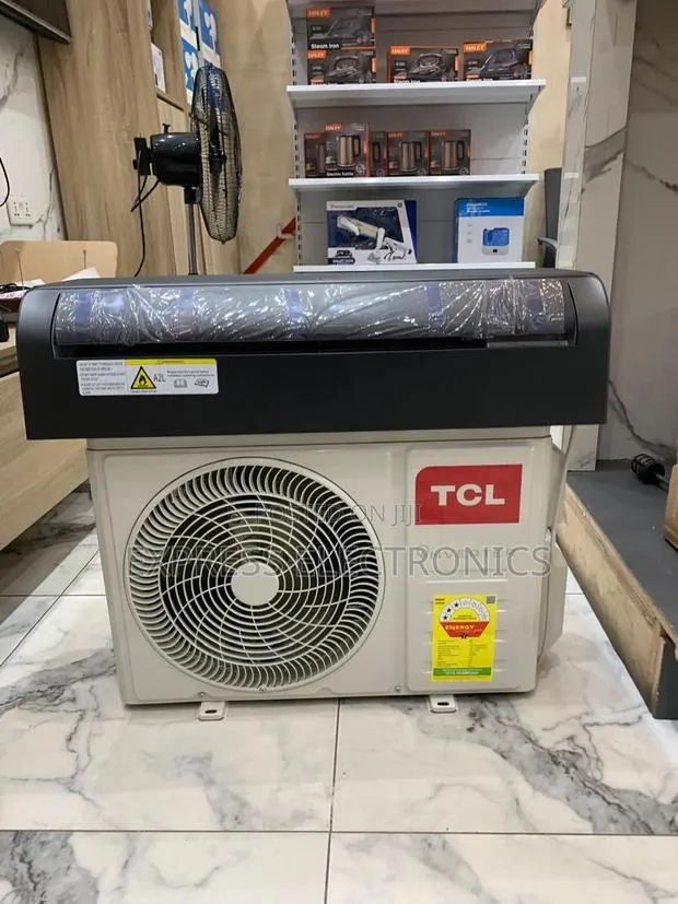 Grab the New Split Inverter 1.5hp Wooden Like TCL Dark Grey · Photo 1