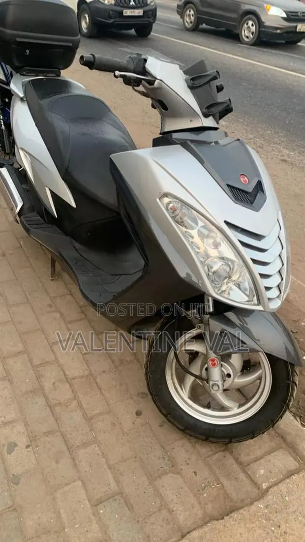 Kymco 2014 Silver · Photo 1