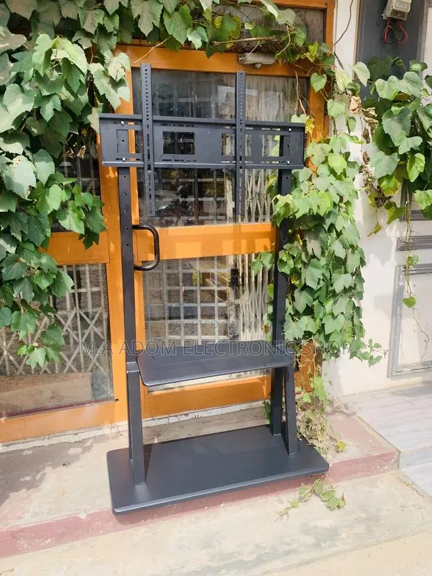 Very Easy to Install Use Tv Stand for Tv Between 60”-100” · Photo 1