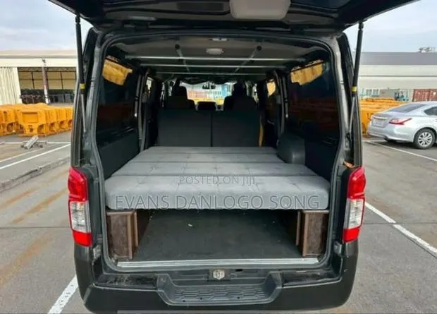 Nissan Caravan (Urvan) 2013 Brown · Photo 1