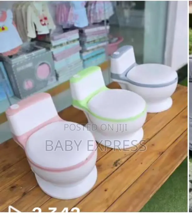 Baby Potty Designed Like an Adult Toilet. Comfortable, Easy to Clean. · Photo 1