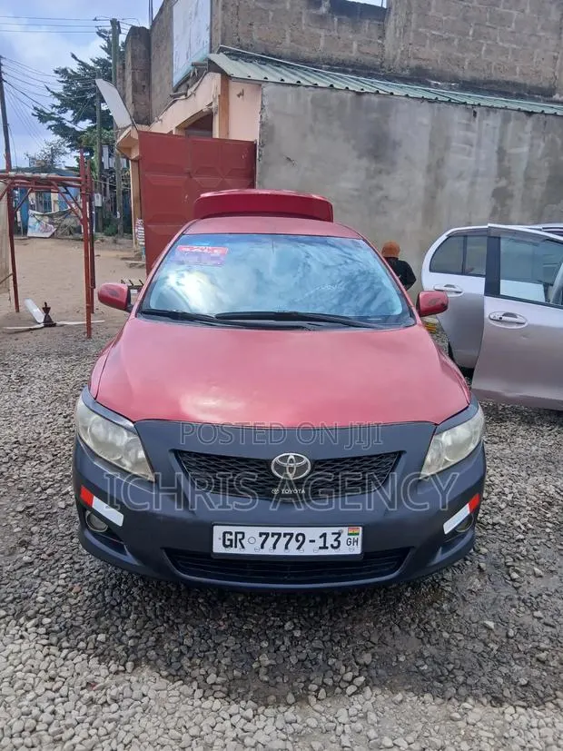 Toyota Corolla LE 4dr Sedan (1.8L 4 cyl 4A) 2009 Red · Photo 1