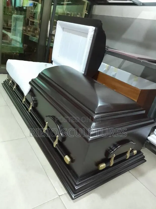 Elegant Ebony Half-Glass Casket · Photo 1