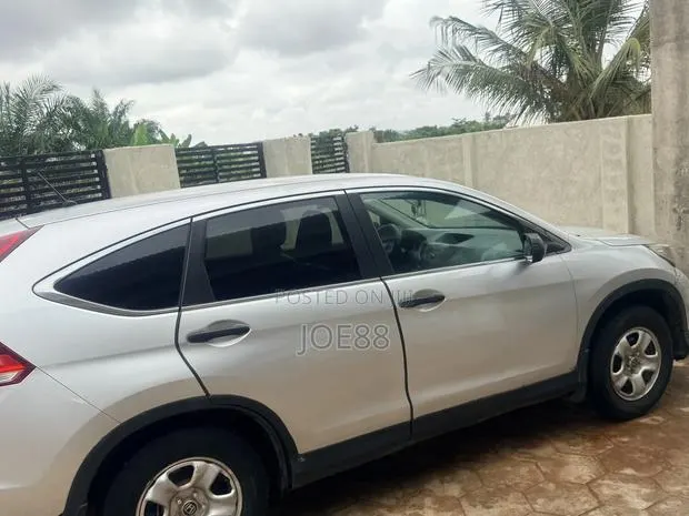 Honda CR-V LX 4dr SUV (2.4L 4cyl 5A) 2014 Silver · Photo 1