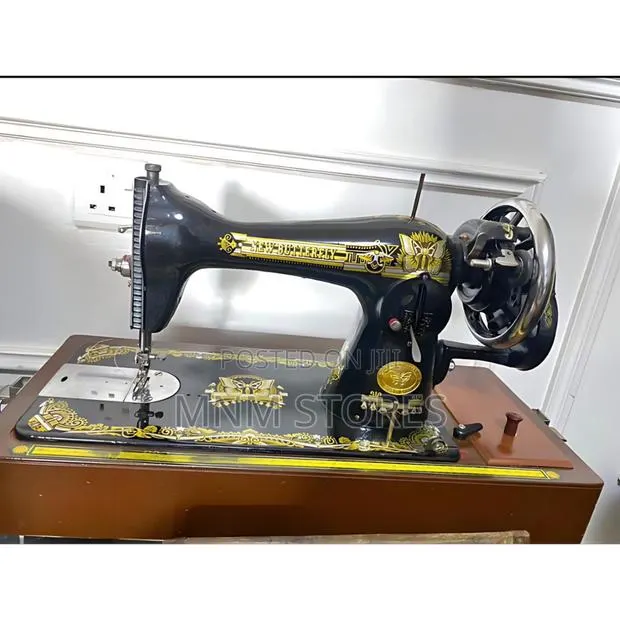 Old Butterfly Sewing Machine · Photo 1