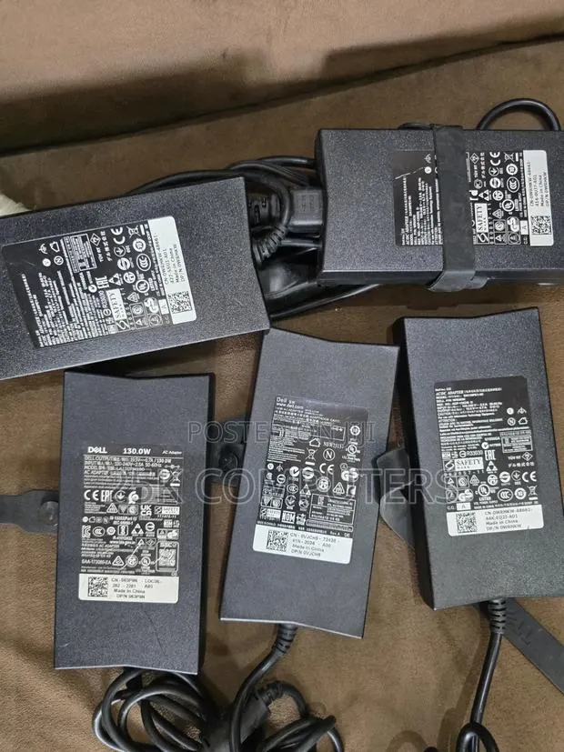 Dell 130 Watts Chargers for Laptops and Desktop · Photo 1