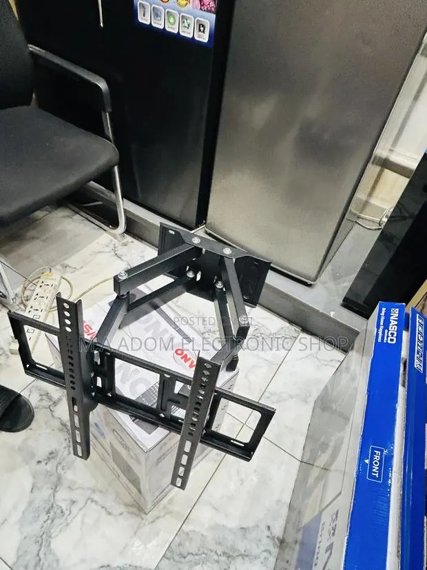 Tv Mount for TVS Between 32”-80” · Photo 1