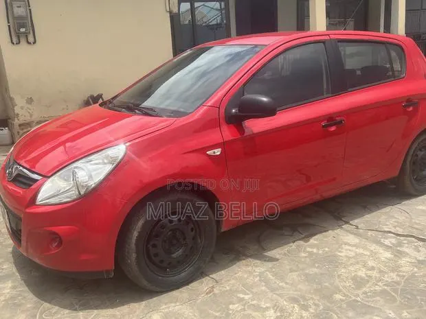 Hyundai i20 1.2 Kappa Petrol with Dual VTVT (MT) 2010 Red · Photo 1