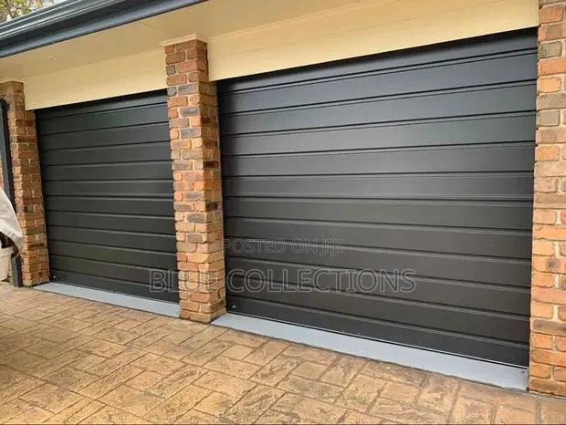 Garage Door With Motor ,Two Remote · Photo 1