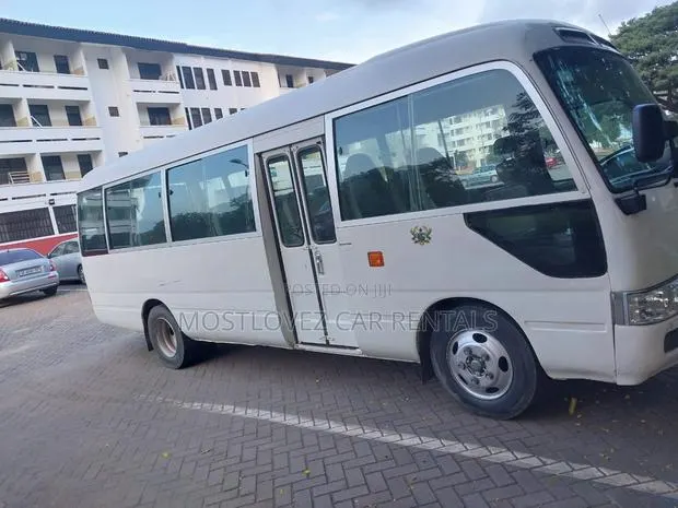 Car Rental- Bus Hire Service in Ghana- Coaster Bus · Photo 1