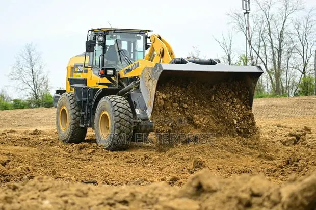 Excavator and Wheel Loader · Photo 1