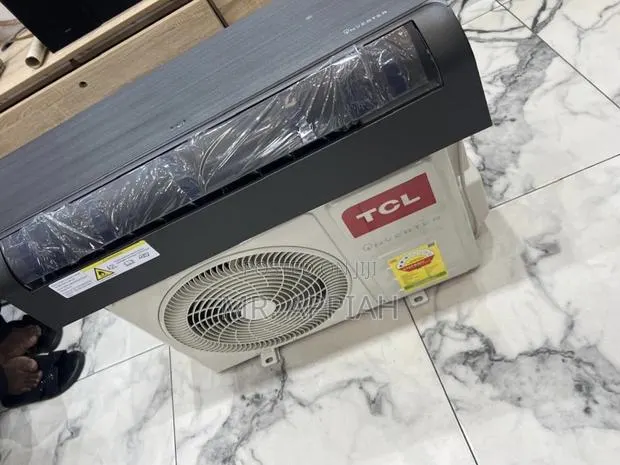 Extremely Cooling TCL 1.5hp Inverter Dark Gray Wooden Finish(Remote) · Photo 1