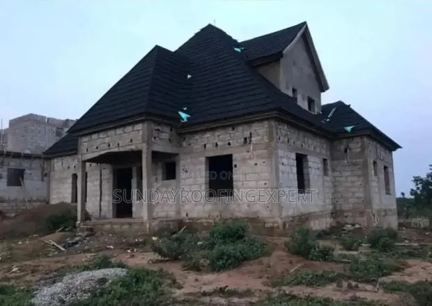 Stone Tiles Roofing · Photo 1