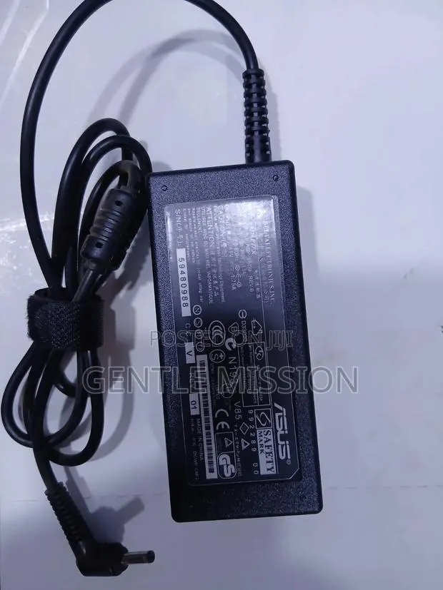 ASUS AC Adapter · Photo 1
