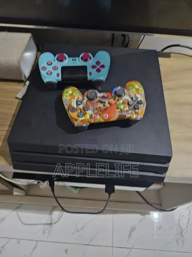 PlayStation 4pro With 4 Games · Photo 1