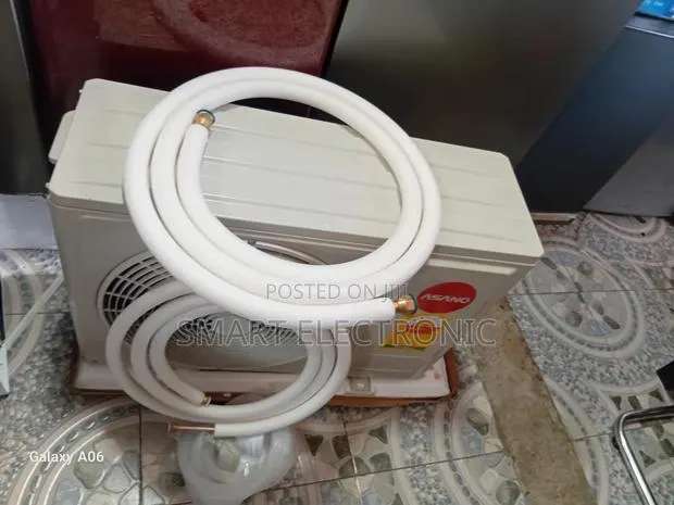 Asano 1.5hp Fast Cooling Air Conditioner System · Photo 1